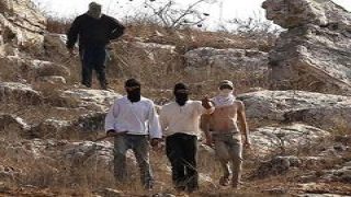 مواطنون يتصدون لهجوم مستوطنين في مخماس شمال القدس